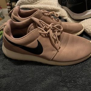 Rose gold Nike tennis shoes size 8.5